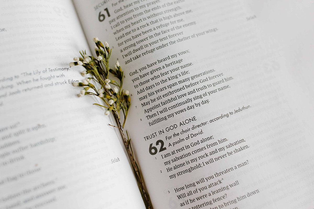 The Bible open to Psalm 62, reading about trust in God alone.