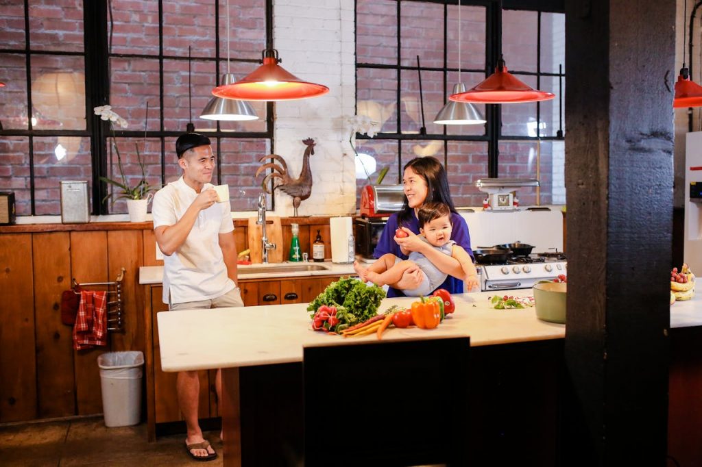 Family enjoying the benefits of a clean house safe for cooking, eating, and living.