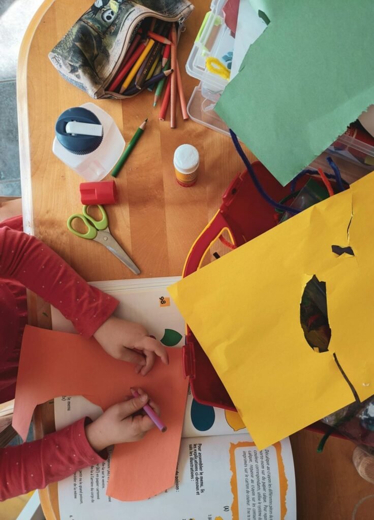 My daughter working on a craft project
